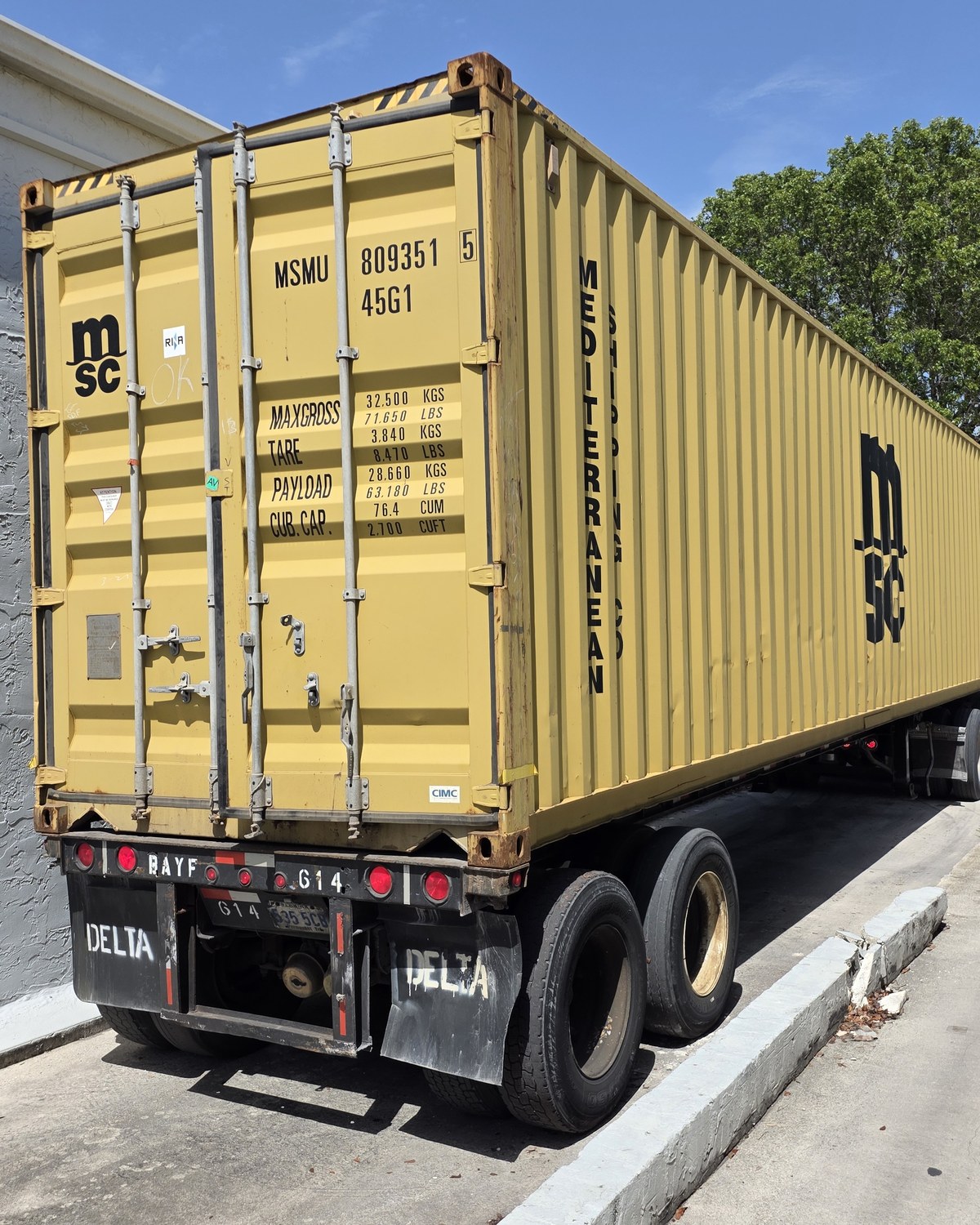 Delivery container arriving at Angels Miracle Market's Lauderdale Lakes warehouse