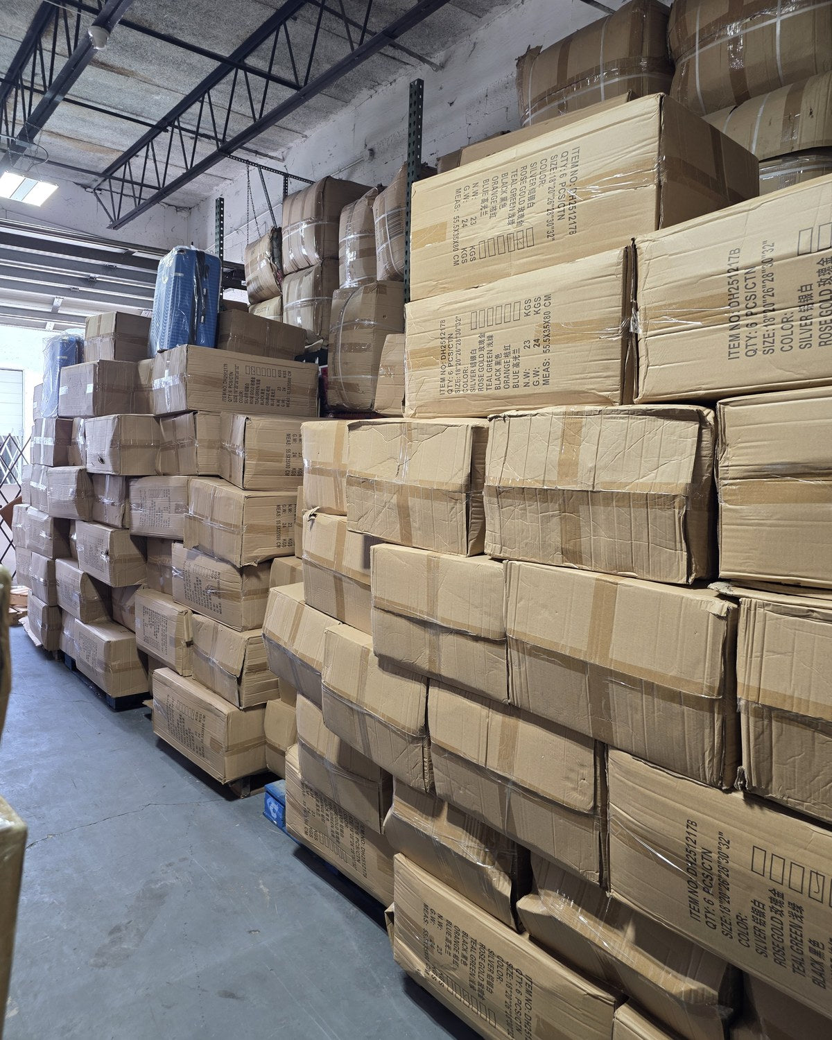 Fresh boxed inventory inside Angels Miracle Market's Lauderdale Lakes warehouse