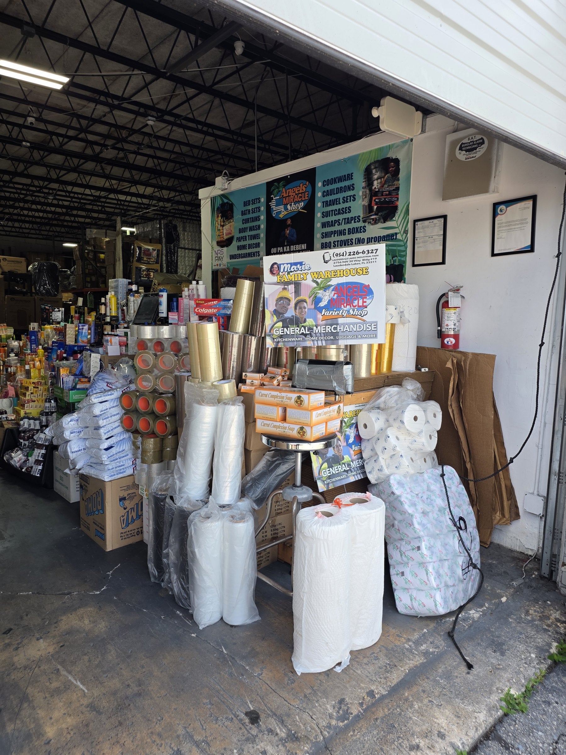 The Angels Miracle Market family and warehouse team